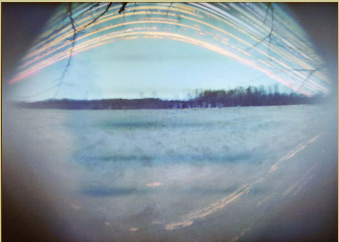 Six month exposure to the apparent daily path of the Sun across the sky from the winter to summer solstices via a pinhole camera at Keppel Henge, Ontario Canada.