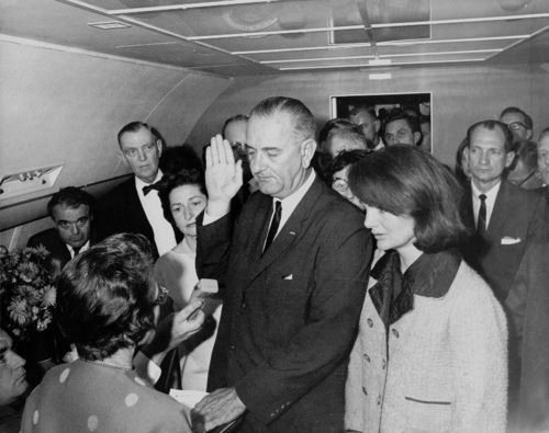 LBJ takes oath of office on Air Force One
