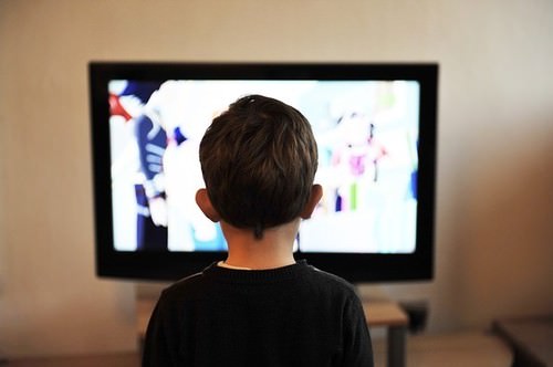 boy in front of television set